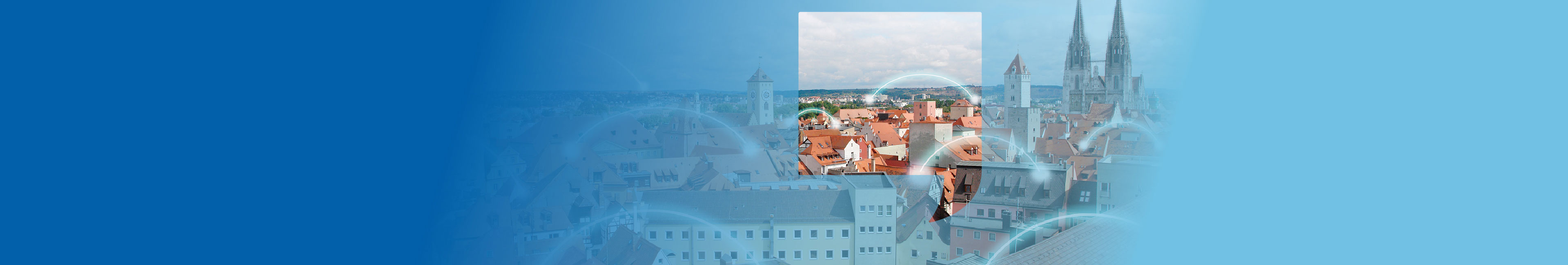 Luftbild von Regensburg mit verbindenden Lichtblitzen zwischen den Häusern, die Internetverbinudngen symbolisieren.